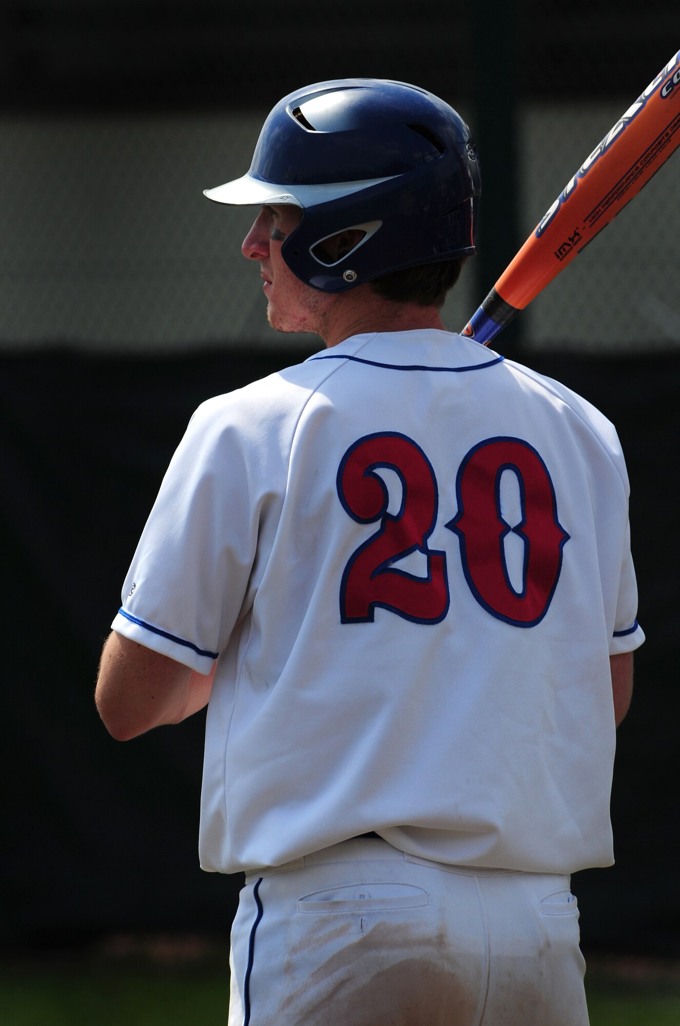 Josh Sloan, third basemen for the Ramstein Royals, keeps an eye on the game as he awaits his turn at bat during the Department of Defense Dependent Schools Europe Baseball European Championships, Ramstein Air Base, Germany, May 29, 2010. The three-day championships consisted of high school teams from all over the European theater in Divisions I, II and III. (U.S. Air Force photo by Staff Sgt. Jocelyn Rich)