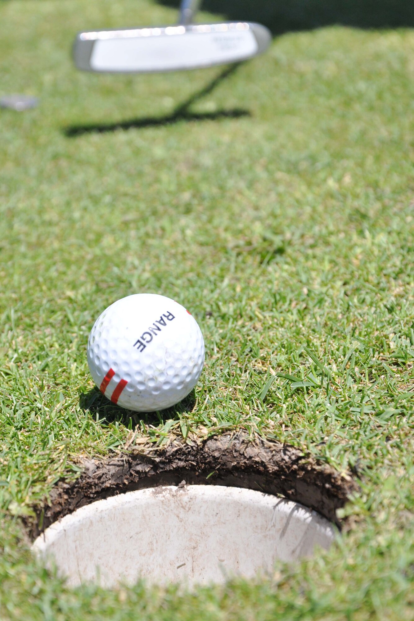 Members of the Transit Center at Manas, Kyrgyzstan, participated in the 3rd Annual Maple Leaf Golf Course ?Friends Support You? tournament May 29, 2010. For the second year in a row, the ?9-1-1? team of civilian contracted emergency responders from the Transit Center fire department and security forces squadron won first place in the event, which benefitted Ed Miles, the owner of the course, who was diagnosed with bladder cancer this year. (U.S. Air Force photo/Staff Sgt. Carolyn Viss)