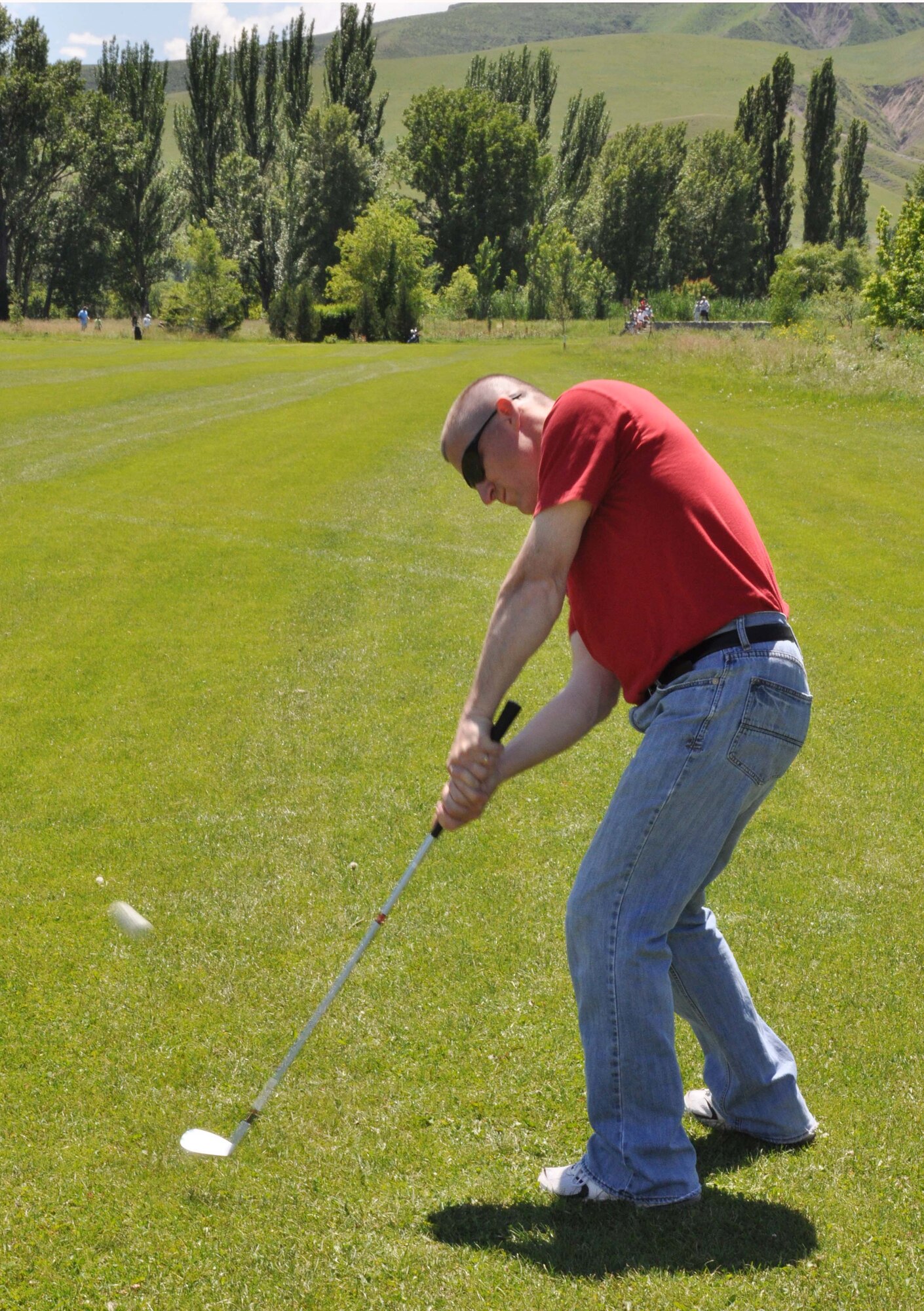 Master Sgt. James Gagner, a first sergeant from the Transit Center at Manas, Kyrgyzstan, participates in the 3rd Annual Maple Leaf Golf Course ?Friends Support You? tournament May 29, 2010. The event benefitted Ed Miles, the owner of the course, who was diagnosed with bladder cancer this year. (U.S. Air Force photo/Staff Sgt. Carolyn Viss)