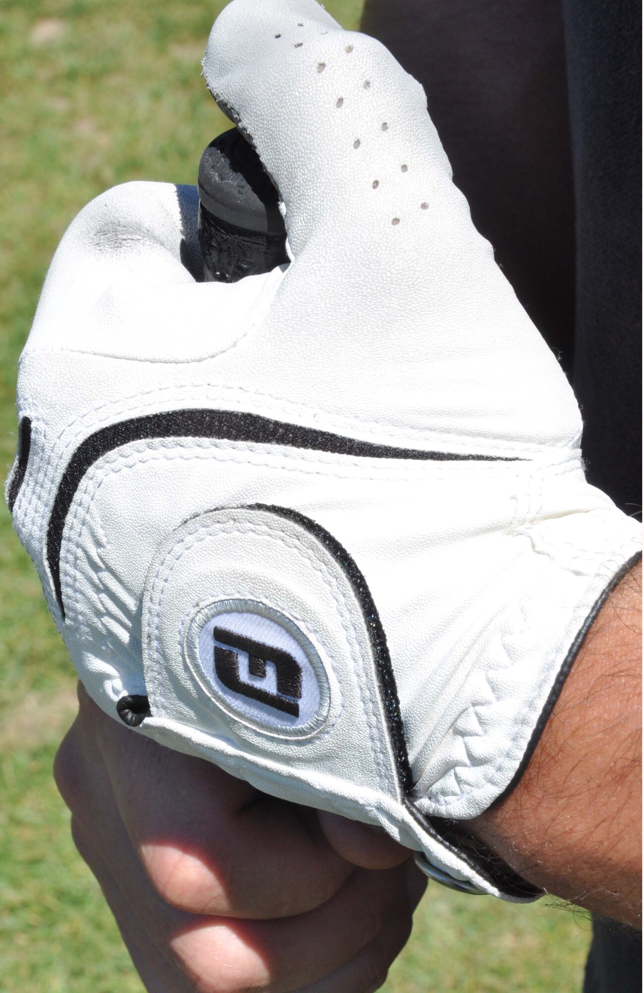 Members of the Transit Center at Manas, Kyrgyzstan, participated in the 3rd Annual Maple Leaf Golf Course ?Friends Support You? tournament May 29, 2010. For the second year in a row, the ?9-1-1? team of civilian contracted emergency responders from the Transit Center fire department and security forces squadron won first place in the event, which benefitted Ed Miles, the owner of the course, who was diagnosed with bladder cancer this year. (U.S. Air Force photo/Staff Sgt. Carolyn Viss)