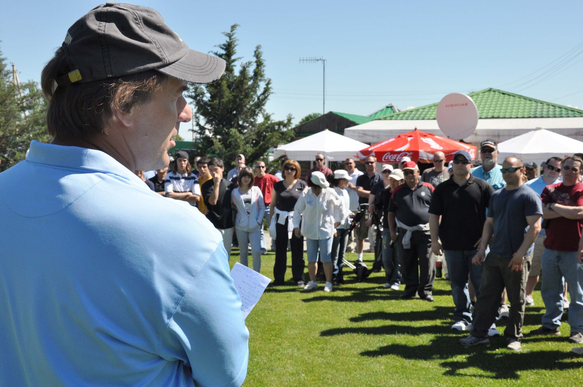 Rodney Stuparyk gives rules and course instructions to golfers at the 3rd Annual Maple Leaf Golf Course ?Friends Support You? tournament May 29, 2010. For the second year in a row, the ?9-1-1? team of civilian contracted emergency responders from the Transit Center fire department and security forces squadron won first place in the event, which raised almost $4,000 to help offset the cost of bladder cancer treatment for Ed Miles, the owner of the course. (U.S. Air Force photo/Staff Sgt. Carolyn Viss)