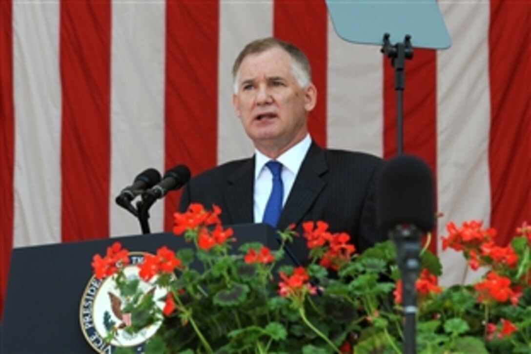 Deputy Secretary of Defense William J. Lynn III delivers remarks at the annual Memorial Day observance at Arlington National Cemetery, Va., May 31, 2010.  Lynn, who hosted the ceremonies, concluded by introducing Vice President Joe Biden, the featured speaker.  