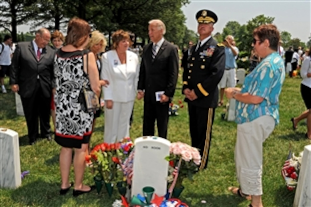 Before leaving Arlington National Cemetery, Va., after speaking at the annual Memorial Day Observance, May 31, 2010, Vice President Joe Biden and his wife Jill stopped by Section 60 - where some of our nation's most recently fallen heroes lie - to talk with family members and offer personal condolences.  