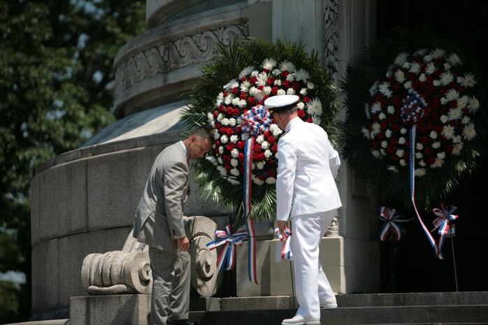 NEW YORK -- Rear Adm. Mark S. Boensel, commander, Navy Mid-Atlantic Region, places a wreaths during the annual Soldier's and Sailor's Memorial Day Observation, at the Soldier's and Sailor's monument in New York, March 31, 2010. Marines and sailors from 3rd Battalion, 9th Marines, Special Purpose Marine Air-Ground Task Force New York, and the USS Iwo Jima gathered with New York citizens and veterans to honor U.S. service members who fought and died in wars past and present. More than 3,000 Marines, Sailors and Coast Guardsmen are in the area participating in community outreach events and equipment demonstrations. This is the 26th year New York City has hosted the sea services for Fleet Week. (Official Marine Corps photo by Cpl Bobbie Curtis / RELEASED)