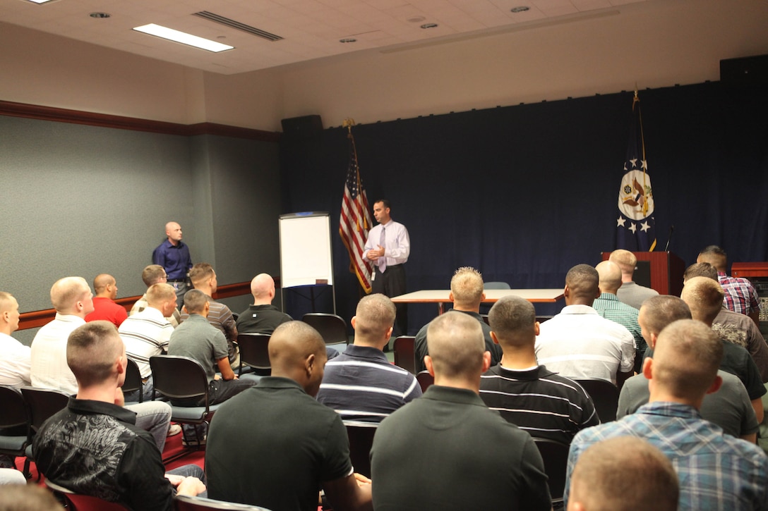 Marines of the 31st Marine Expeditionary Unit receive a welcome briefing at the U.S. Embassy in Singapore from the Marine Detachment Commander Staff Sgt. Matthew Holcomb and the embassy Regional Security Officer, Oct. 30.  The Marines received a tour of the embassy and saw a day in the life of a Marine Security Guard during a port visit while on their deployment with the 31st MEU in the Asia-Pacific region.