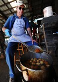 Chief Master Sgt. (Ret.) James Newberry fries fresh jalapeno poppers at the Chiefs Fish Fry Oct. 29, 2010, on Joint Base Charleston, S.C. The fish fry began as a barbeque in 1987 as a way to unite the Reserve and active-duty members on the Air Base. This year, the chiefs cooked food to serve more than 500 people. (U.S. Air Force photo/Senior Airman Timothy Taylor)