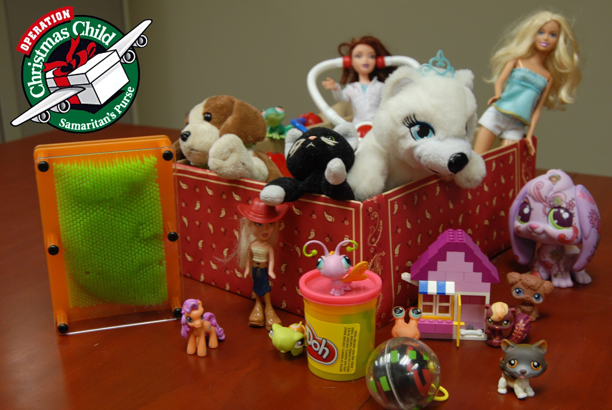 GOODFELLOW AIR FORCE BASE, Texas - Gift-filled shoe boxes can be dropped off at the Base Chapel, Nov 15-22, Monday-Friday 9 a.m. -3 p.m. and Sunday 9 a.m. - 12 p.m. For more information call (325) 227-8982 or (325) 654-3424. (U.S. Air Force illustration/Senior Airman Tong Duong) 