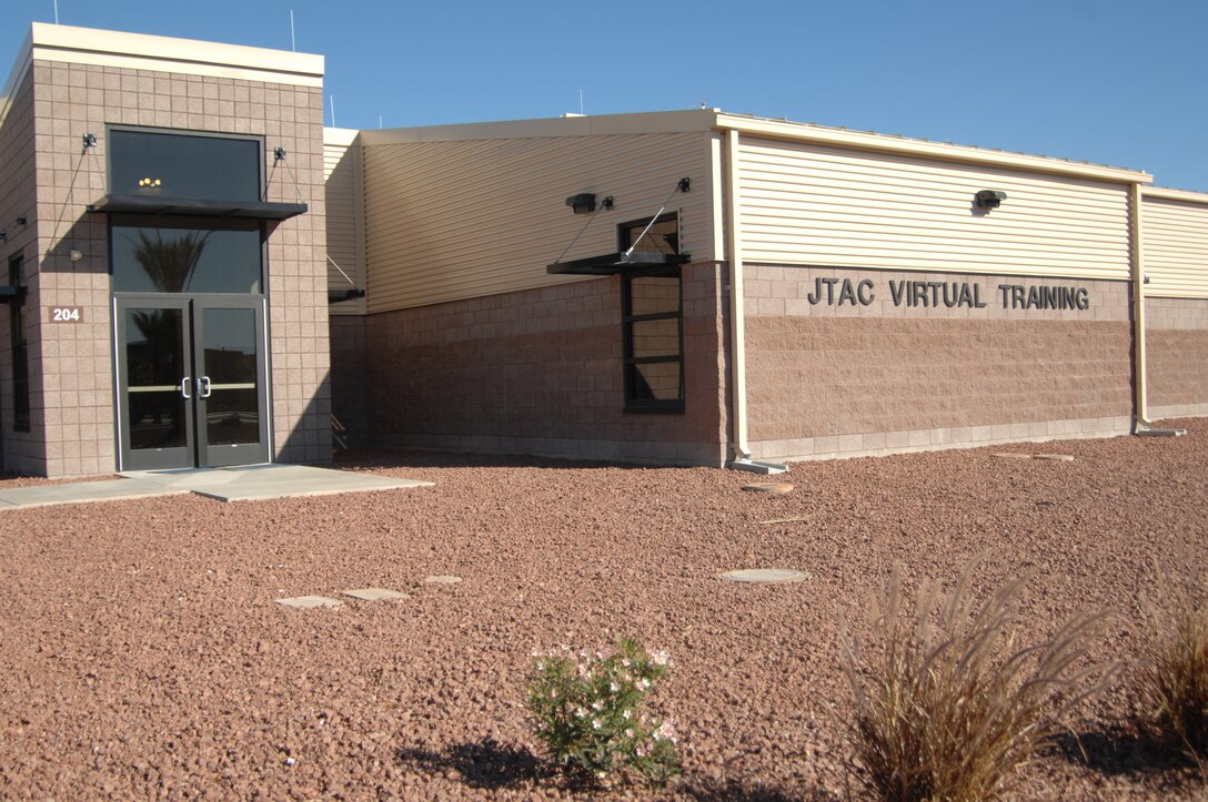NELLIS AIR FORCE BASE, Nev.-- The Nellis Joint Terminal Attack Controller Simulation Facility opened for its first class Oct. 15. The simulation facility provides the space and latest simulation technology to train Airmen properly for the JTAC mission. (U.S. Air Force photo by Senior Airman Michael Charles)