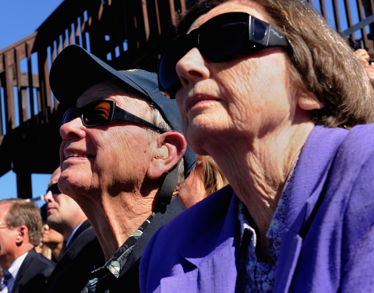 MOODY AIR FORCE BASE, Ga. -- Charles Kern, retired Flying Tiger member, and his wife Nancy, watch as an HC-130P Combat King aircraft and two HH-60G Pavehawk helicopters perform in-flight refueling during a combat search and rescue demonstration for the Flying Tiger Reunion here Oct. 30. Mr. Kern flew an F-89 Scorpion aircraft in 1956 and 1957. (U.S. Air Force photo/Airman 1st Class Benjamin Wiseman)(RELEASED)