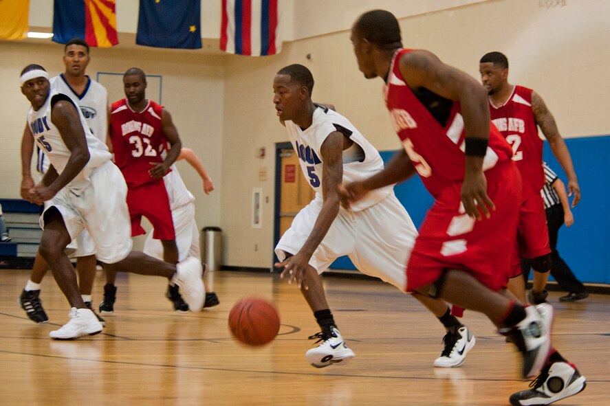 MOODY AIR FORCE BASE, Ga. -- Aaron Yarborough, varsity team point guard, advances up court during a basketball game against Robins Air Force Base Oct. 30. Yarborough scored 10 of the team's 34 points in the second half and 16 points during the entire game. (U.S. Air Force photo/Senior Airman Jamal D. Sutter)(RELEASED)