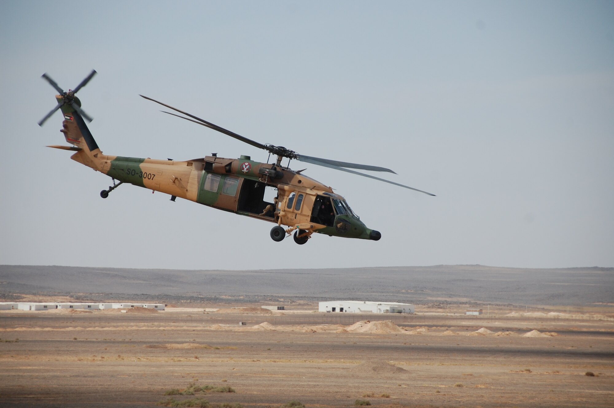 A Royal Jordanian Air Force Helicopter takes to the skies over Azraq, Jordan, during a live fire demonstration at Falcon Air Meet 2010. More than 250 members came from various bases in support of U.S. Air Forces Central Command's participation in Falcon Air Meet including F-16s from the 20th Fighter Wing, Shaw Air Force Base, S.C. (U.S. Air Force Photo by Mr. Alan Black)