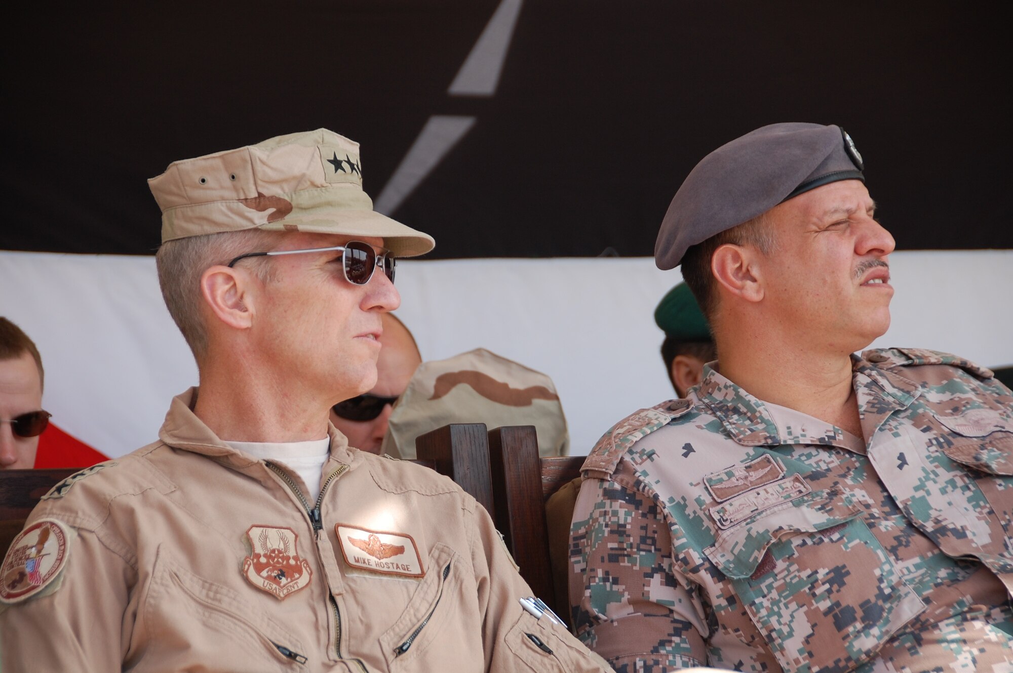 Lt. Gen. Mike Hostage, U.S. Air Forces Central Command commander, watches a live fire demonstration with Prince Faisal bin Al Hussein of Jordan during Falcon Air Meet 2010 at the Royal Jordanian Air Base in Azraq, Jordan. General Hostage visited the base Nov. 1 where a contingent of 250 Air Force members have been competing in a two week competition with Jordan, Pakistan and the United Arab Emirates. (U.S. Air Force Photo by Mr. Alan Black)