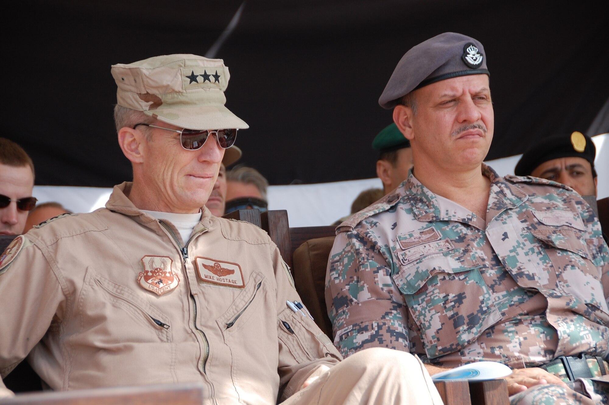 Lt. Gen. Mike Hostage, U.S. Air Forces Central Command commander, watches a live fire demonstration with Prince Faisal bin Al Hussein of Jordan during Falcon Air Meet 2010 at the Royal Jordanian Air Base in Azraq, Jordan. General Hostage visited the base Nov. 1 where a contingent of 250 Air Force members have been competing in a two week competition with Jordan, Pakistan and the United Arab Emirates. (U.S. Air Force Photo by Mr. Alan Black)