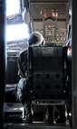 Maj. Christopher Papa studies the controls of the C-27J Spartan during a familiarization flight over New England Friday, Oct. 22, 2010.  Maj. Papa is currently assigned to the 118th Airlift Squadron, Bradley Air National Guard Base in East Granby, Conn. and was among the first of the Flying Yankees to fly the new light cargo aircraft that visited the base to give members there a glimpse of their future mission.