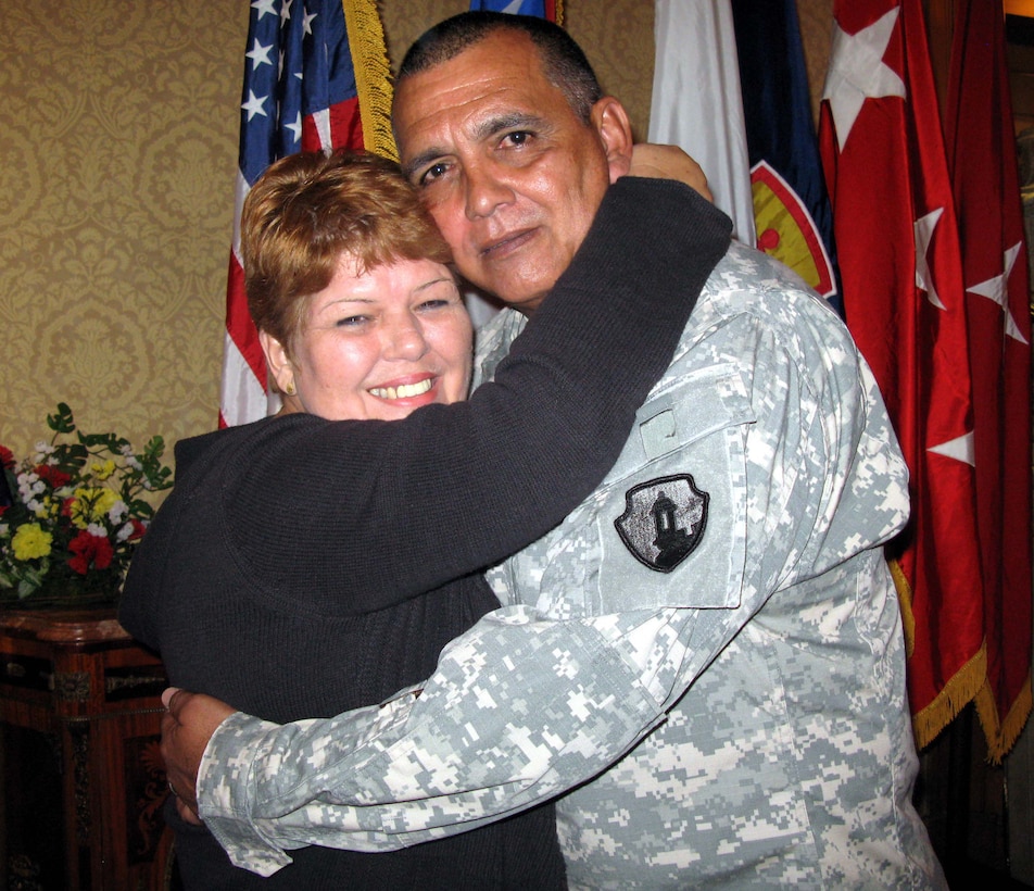 Army Command Sgt. Maj. Ariel Feliciano, the 1st Mission Support Command’s first sergeant, and his wife, Barbara Rodriguez, say two deployments to Iraq have actually strengthened their 35-year marriage. The couple participated in a Yellow Ribbon Reintegration Program event in San Juan, Puerto Rico, Oct. 30-31, 2010. DOD photo by Donna Miles