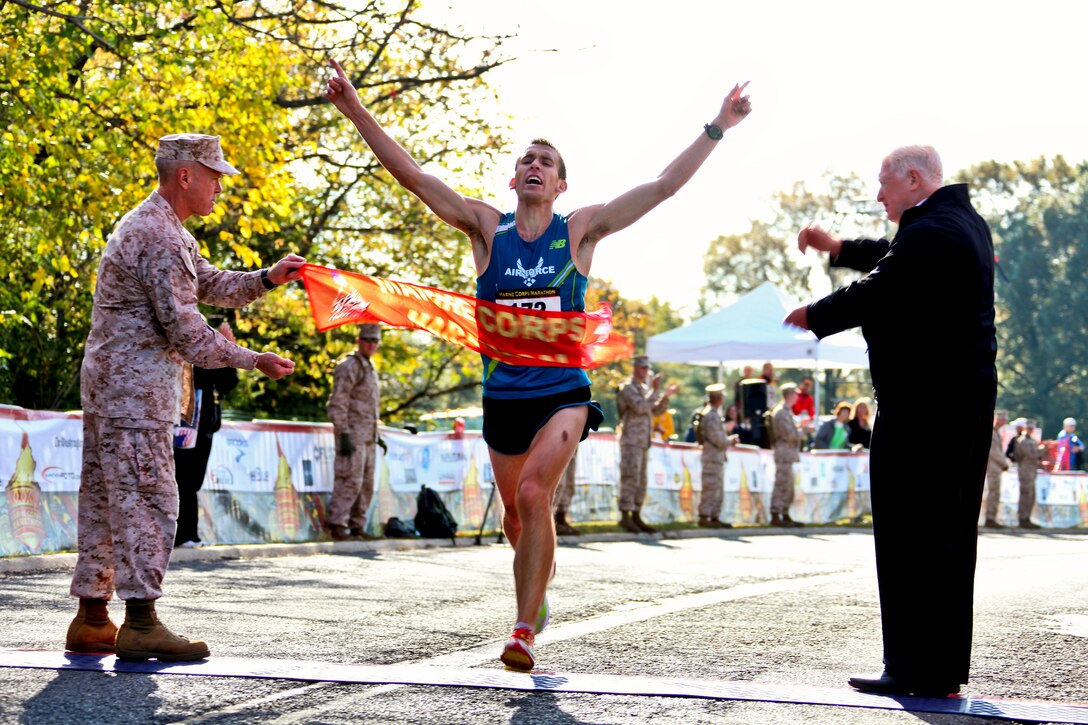 U.S. Air Force 2nd Lt. Jacob Bradosky crosses the finish line to win the 35th annual Marine Corps Marathon in Arlington, Va., Oct. 31, 2010. Bradosky, stationed on Vandenberg Air Force Base, Calif., finished the 26.2-mile journey in 2:23:30.