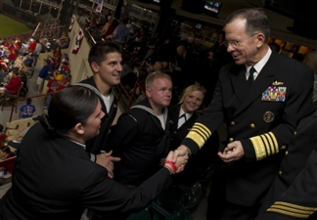 Chairman of the Joint Chiefs of Staff Adm. Mike Mullen greets Navy sailors at Game 4 of the 106th World Series between the San Francisco Giants and Texas Rangers in Arlington, Texas, on Oct. 31, 2010.  Major League Baseball dedicated the game to the Welcome Back Veterans initiative that honors and encourages support of returning military members and their families.  
