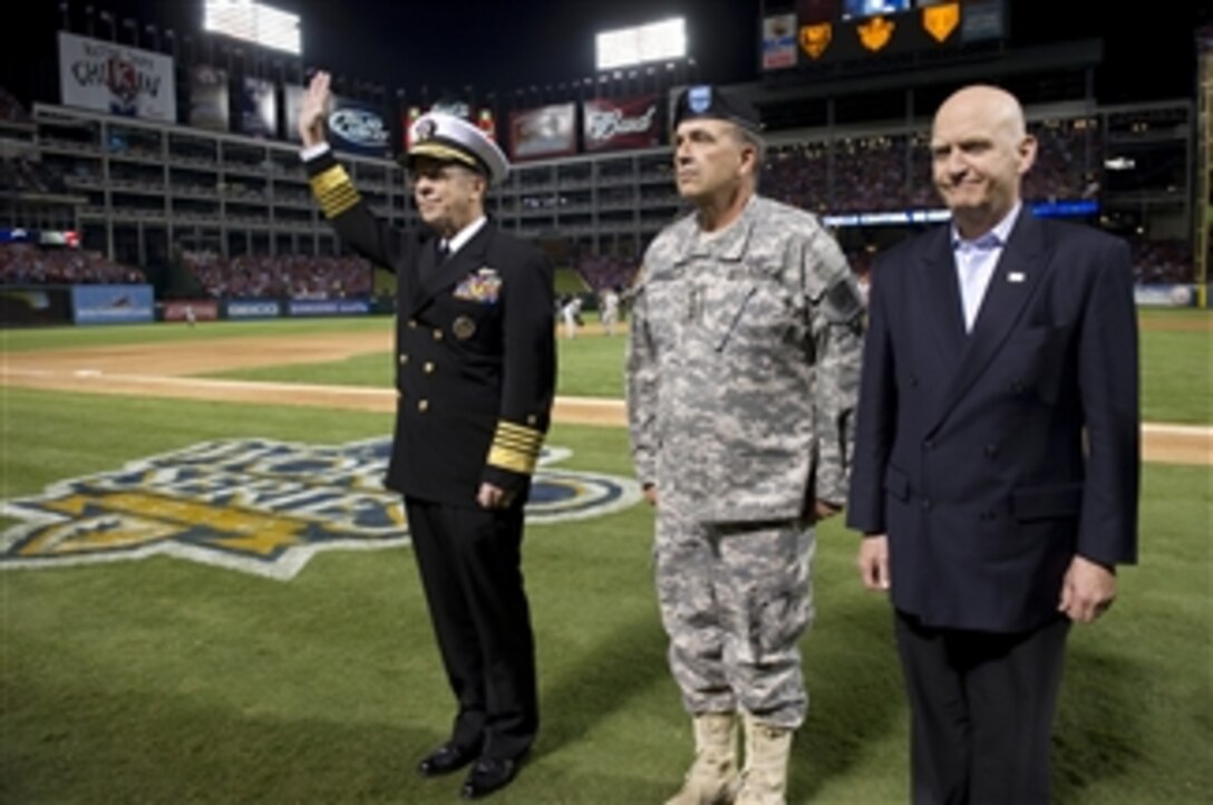 Chairman of the Joint Chiefs of Staff Adm. Mike Mullen, Army Vice Chief of Staff Gen. Peter W. Chiarelli and Deputy Undersecretary of Defense for Wounded Warrior Care and Transition Policy John Campbell are recognized for their dedication to service members and their families during Game 4 of the 106th World Series between the San Francisco Giants and Texas Rangers in Arlington, Texas, on Oct. 31, 2010.  Major League Baseball dedicated the game to the Welcome Back Veterans initiative that honors and encourages support of returning military members and their families.  