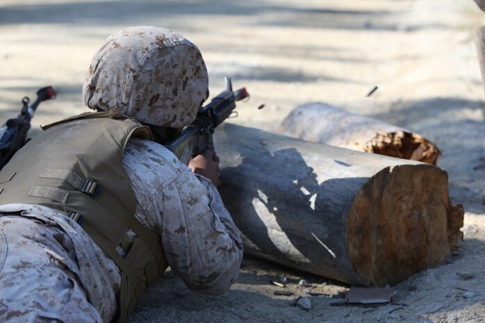 Cpl. Arturo Alvarado, a supply administrative specialist with 2nd Medical Battalion, Combat Logistics Regiment 25, 2nd Marine Logistics Group, engages an enemy during a field exercise aboard Camp Lejeune, N.C., Nov. 2, 2010. The battalion participated in the five-day training evolution from Oct. 30 to Nov. 4 at the base’s Military Operations on Urban Terrain training facility, known as MOUT Town, in preparation for their upcoming deployment to Afghanistan. (U.S. Marine Corps photo by Pfc. Franklin E. Mercado)