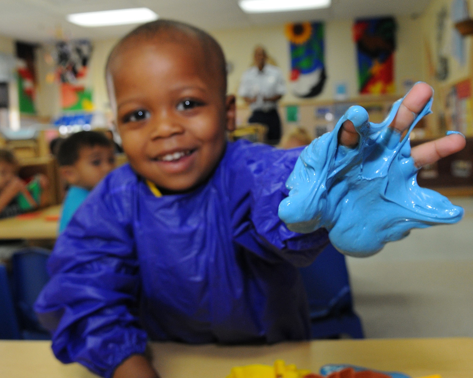 Tyler Ellis, plays with silly puddy at the Child Development Center Oct. 18. (U.S. Air Force photo/ Senior Airman Nichelle Anderson)