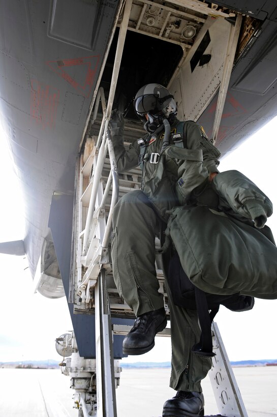 ELLSWORTH AIR FORCE BASE, S.D. - Capt. Patrick Mullen, 37th Bomb Squadron pilot, exits a B-1B Lancer during an engine-running crew change, Oct. 27.  The B-1 is a highly versatile, multi-mission weapon system which carries the largest payload of both guided and unguided weapons of any aircraft in the Air Force inventory. (U.S. Air Force photo/Staff Sgt. Marc I. Lane)