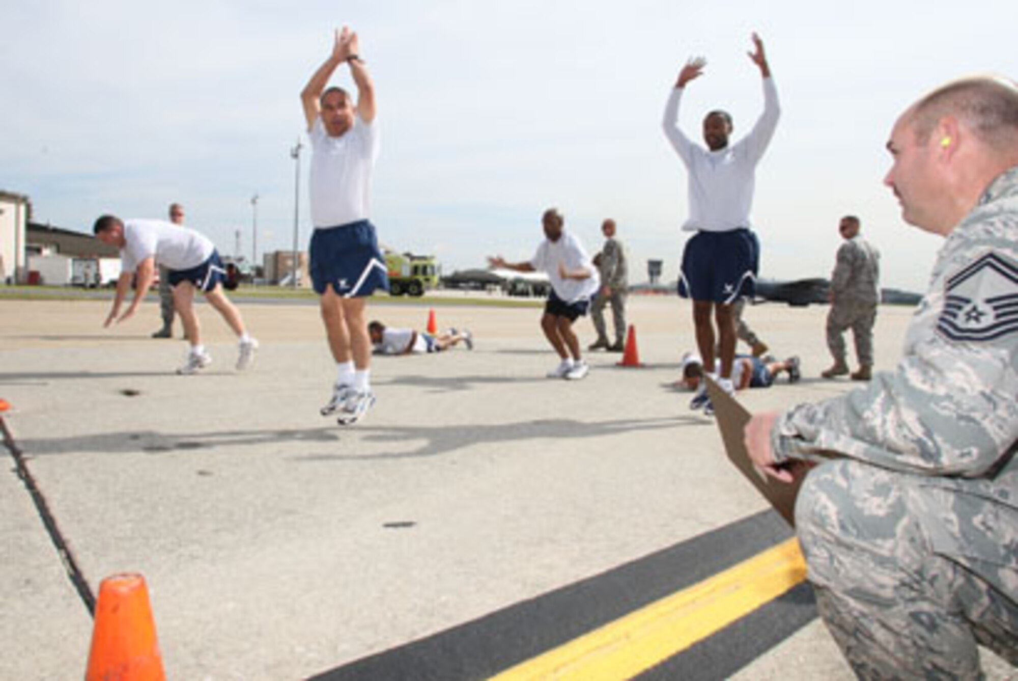 Members compete in the fitness challenge as one of the events for Port Dawg Challenge 2010 held here 25-29 Oct. (U.S. Air Force Photo/Don Peek)
