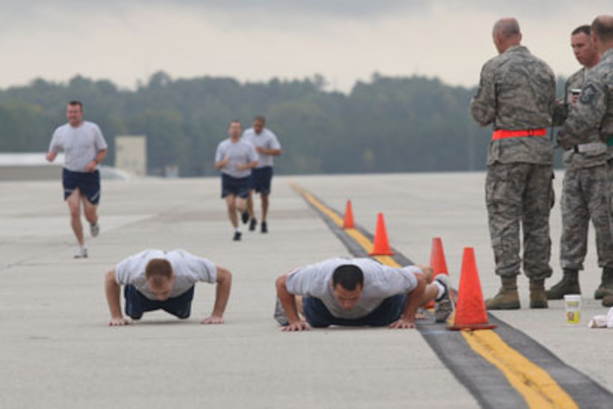 Competing in the Fitness Challenge event at the Port Dawg Challenge 2010. (U.S. Air Force Photo/Don Peek)