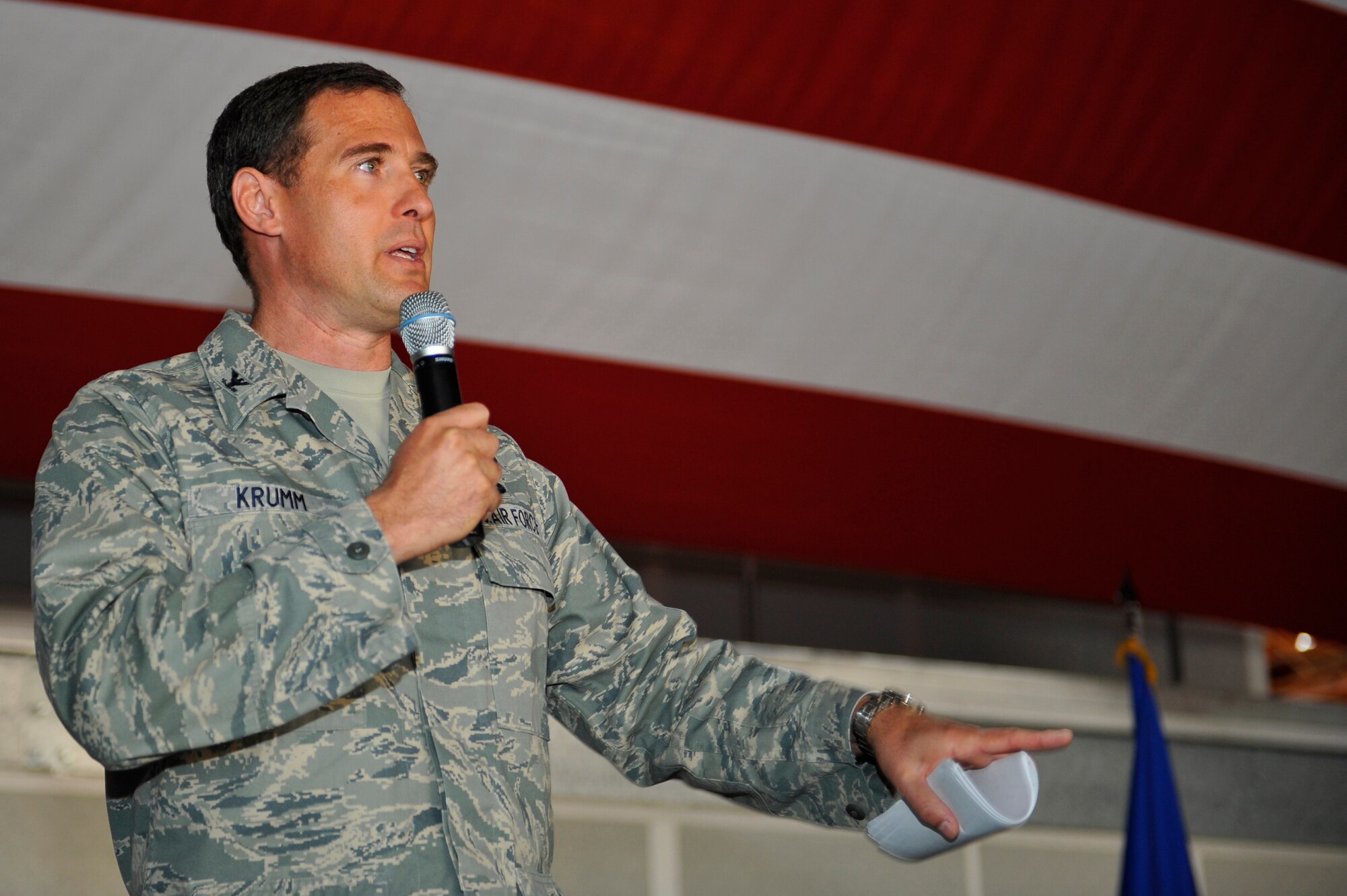 HOLLOMAN AIR FORCE BASE, N.M. -- Col. David Krumm, 49th Wing commander, speaks to Team Holloman during a Commander's Call Nov. 1, 2010. During the event, Colonel Krumm stressed the importance of wingmanship and readiness, while also expressing his continued appreciation for the Holloman Airmen. (U.S. Air Force photo by Senior Airman Veronica Stamps/Released)