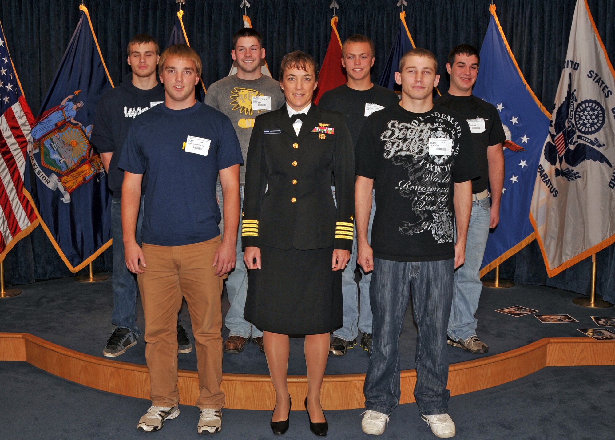 Former U.S. Astronaut U.S. Navy 1st Capt. Heidemarie M. Stefanyshyn-Piper poses with the people she gave the Oath of Enlistment to at the Military Entrance Processing Station November 1, 2010, Niagara Falls NY. Among those being sworn in is her son Michael Piper who will shipping to Navy Boot Camp.  (U.S. Air Force photo by Staff Sgt. Joseph McKee)