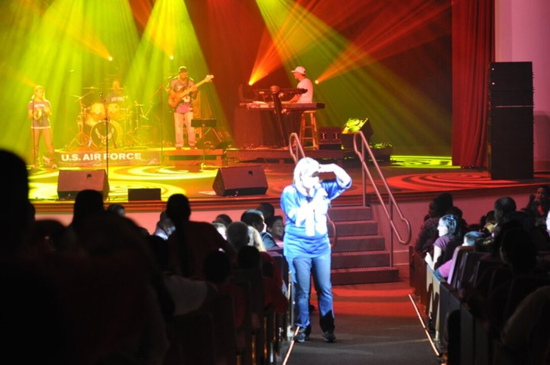 SSgt Mary Beth McFann works the crowd during a Red Ribbon Week performance by Top Flight in San Antonio, October 2010.