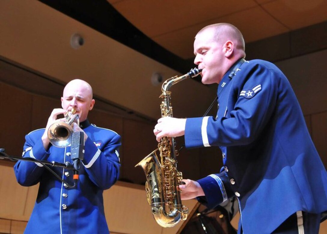 Airman 1st Class Ken Jones and Airman 1st Class Ryan Leatherman perform with Dimensions in Blue in Rio Rancho, New Mexico in October, 2010.