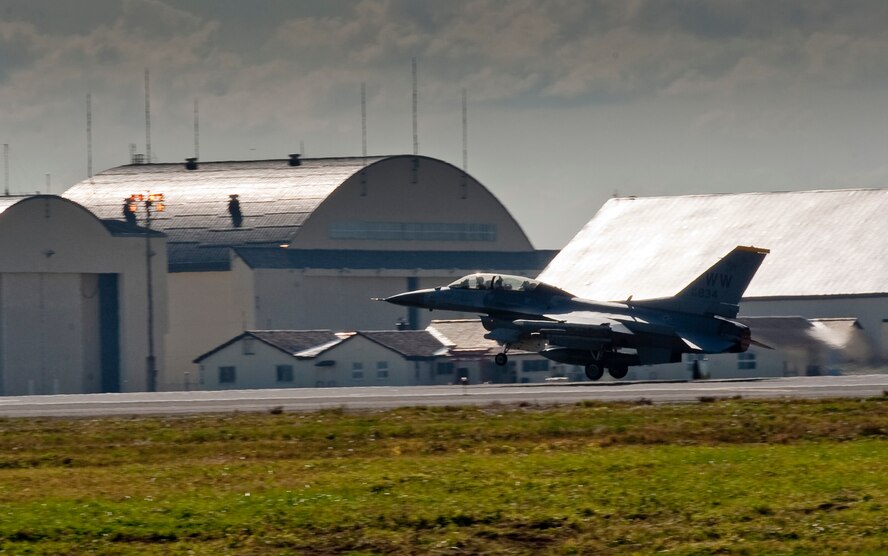 U.S. Air Force Capt. Chris Nations, 14th Fighter Squadron standardization and evaluations officer, and Staff Sgt. Bernard Mutz, 35th Civil Engineer Squadron readiness and emergency manager, take off in an F-16 Fighting Falcon at Misawa Air Base, Japan, Oct. 22, 2010. Sergeant Mutz said he enjoyed seeing the fall colors in the Hokkaido Mountains during his flight which he earned through outstanding service while assigned to the wing. (U.S. Air Force photo by Staff Sgt. Samuel Morse/Released)