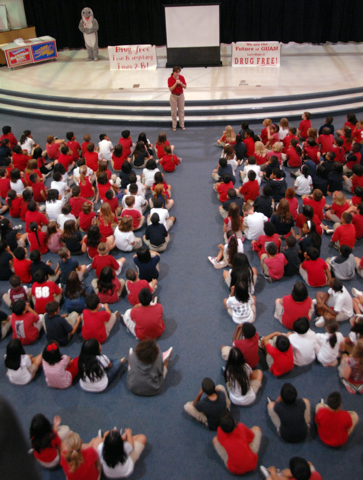 Jennifer Andree, Andersen drug program administrative manager, speaks to Andersen Elementary students about the dangers of drugs and alcohol abuse at AES Oct. 26. During Red Ribbon Week, the last week in October, children and adolescents are taught effective ways to sustain from drugs and say no in peer pressure situations. (U.S. Air Force photo/Airman Whitney Amstutz)