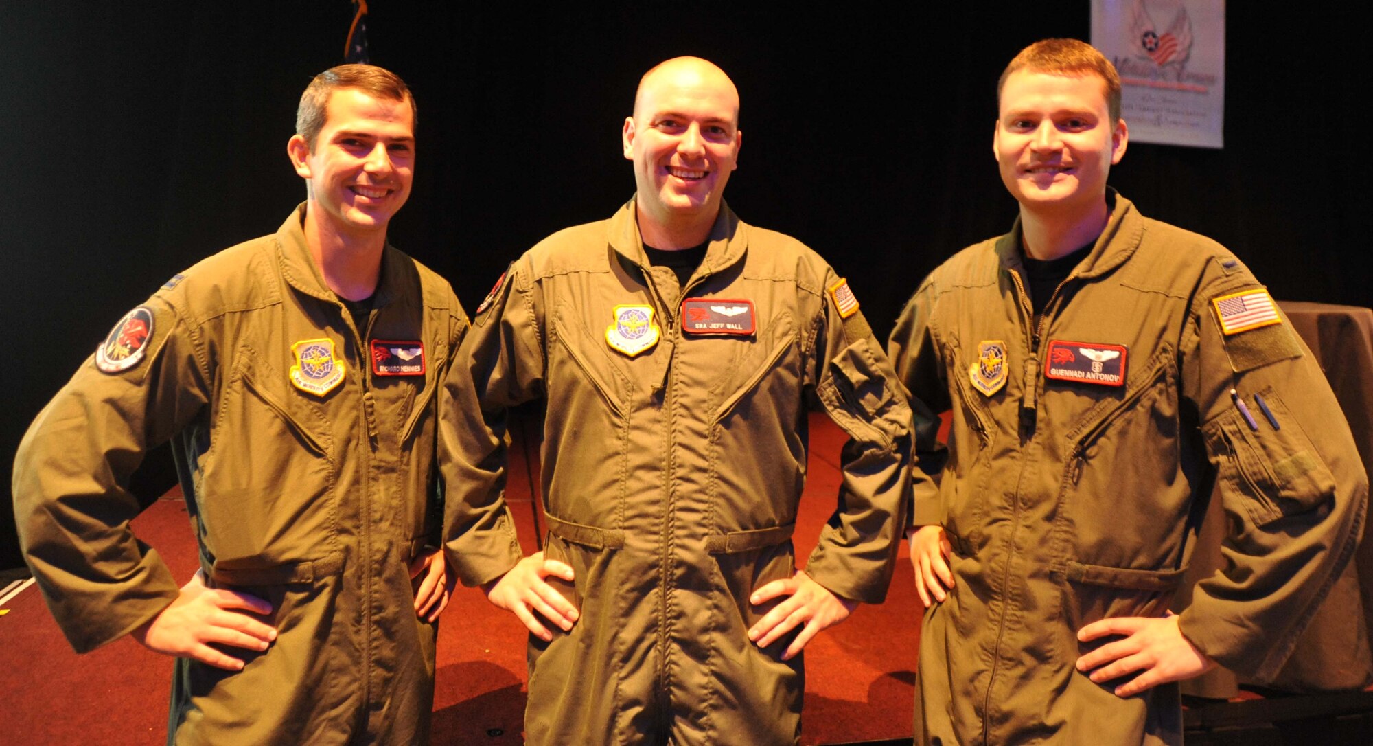 (From left to right) Capt. Richard Hennies, 350th Air Refueling Squadron executive officer, Senior Airman Jeff Wall, 350th ARS boom operator, and 1st Lt. Guennadi Antonov, 350th ARS mobility officer, pose for a picture after being recognized by Gen. Raymond E. Johns, Air Mobility Command commander Oct. 30, 2010, Orlando, Fla.  While deployed to southwest Asia, the Airmen refueled two A-10 Thunderbolts that were providing combat air support for friendly forces engaged in a firefight on the ground.  (U.S. Air Force/Senior Airman Abigail Klein)