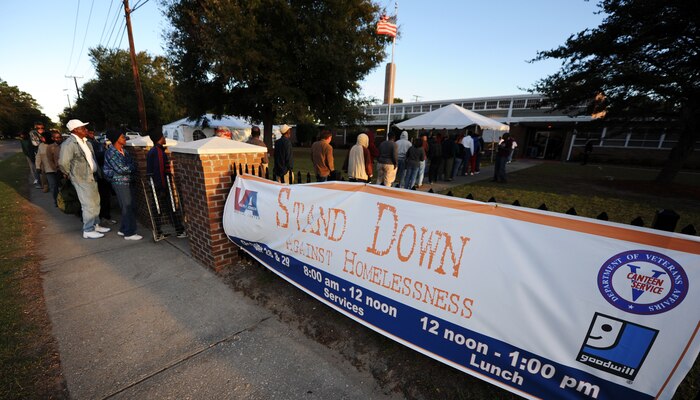 Homeless people, both veterans and civilians line up to begin the check in process to receive aid from local volunteers at the 11th annual Stand Down Against Homelessness Oct. 29, 2010, at the North Charleston Armory Park, S.C. More than 300 volunteers from the local community and members of the local military volunteered their time. (U.S. Air Force photo/Senior Airman Timothy Taylor)