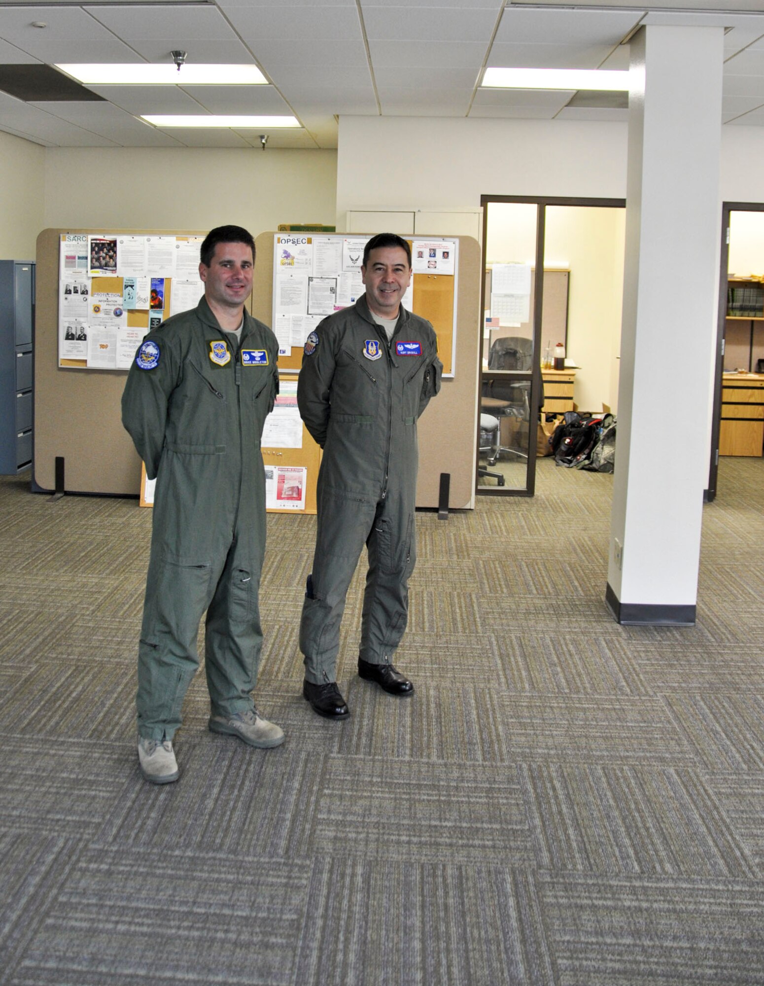 912th Air Refueling Squadron Commander Lt. Col. Brice Middleton (left) stands with 336th Air Refueling Squadron Commander Lt. Col. Kurt Driskill in the open space that will eventually house desks for members of the 912 ARS.  The 912 ARS stood up Oct. 1, 2010 as an active duty associate unit with the 336 ARS at March Air Reserve Base, Calif. 
