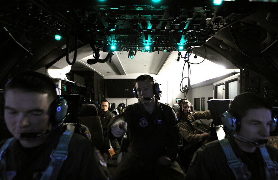 MOODY AIR FORCE BASE, Ga. -- A crew prepares to take off in a C-130 simulator during training here Nov. 1. The crew consisted of two pilots, a flight engineer, a navigator and a communications specialist, who are all going through the simulator class together as a group. (U.S. Air Force photo/Airman 1st Class Benjamin Wiseman)(RELEASED)