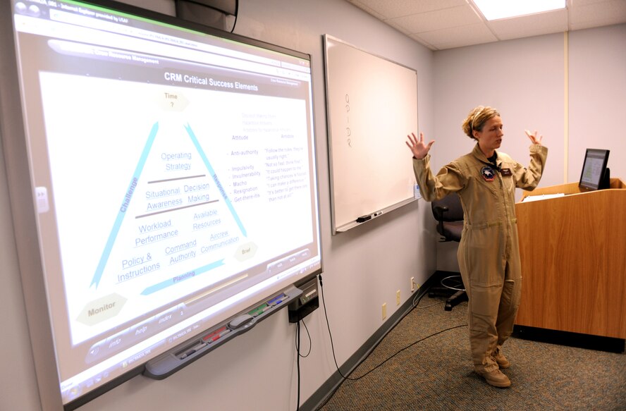 MOODY AIR FORCE BASE, Ga. -- Rebecca Reed, contracted simulator instructor, teaches a class during the C-130 flight simulator training course here Nov. 1. Ms. Reed asked the class to share their stories of problems that they have encountered during real world flights. (U.S. Air Force photo/Airman 1st Class Benjamin Wiseman)(RELEASED) 