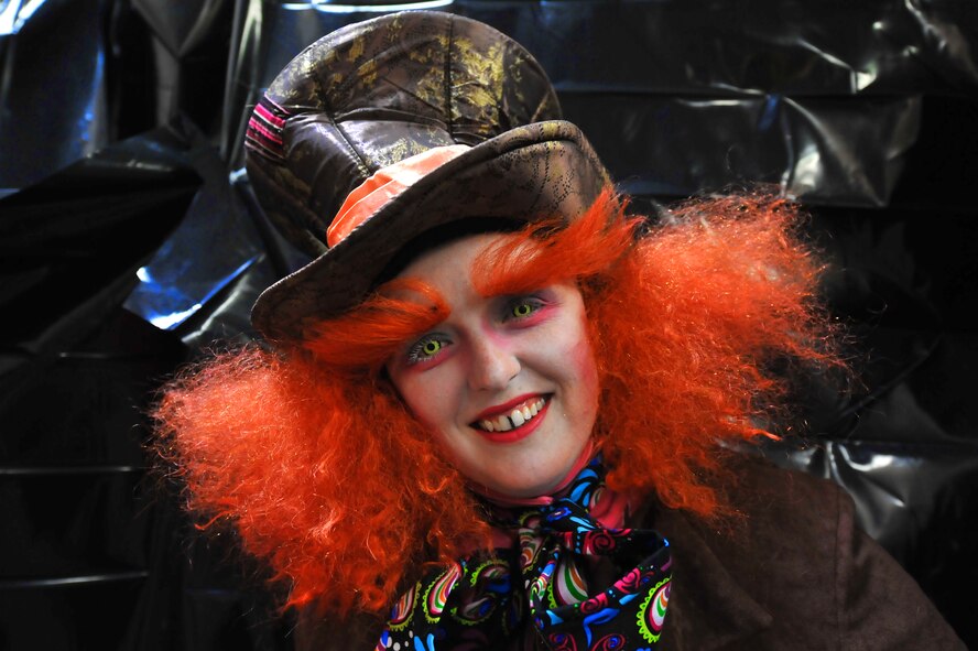 MINOT AIR FORCE BASE, N.D. -- Rebecca Zaharia, 5th Force Support Squadron marketing assistant, displays her outstanding make-up talent as she assumes the identity of the Mad Hatter. Ms. Zahira volunteered to guide victims through the 5th FSS haunted house inside the Minot Outdoor Recreation Facility here Oct. 29. Events like these keep Airmen and family morale and spirits high as cold and snow become a mainstay for Team Minot. (U.S. Air Force photo by Master Sgt. Michael Gaddis)