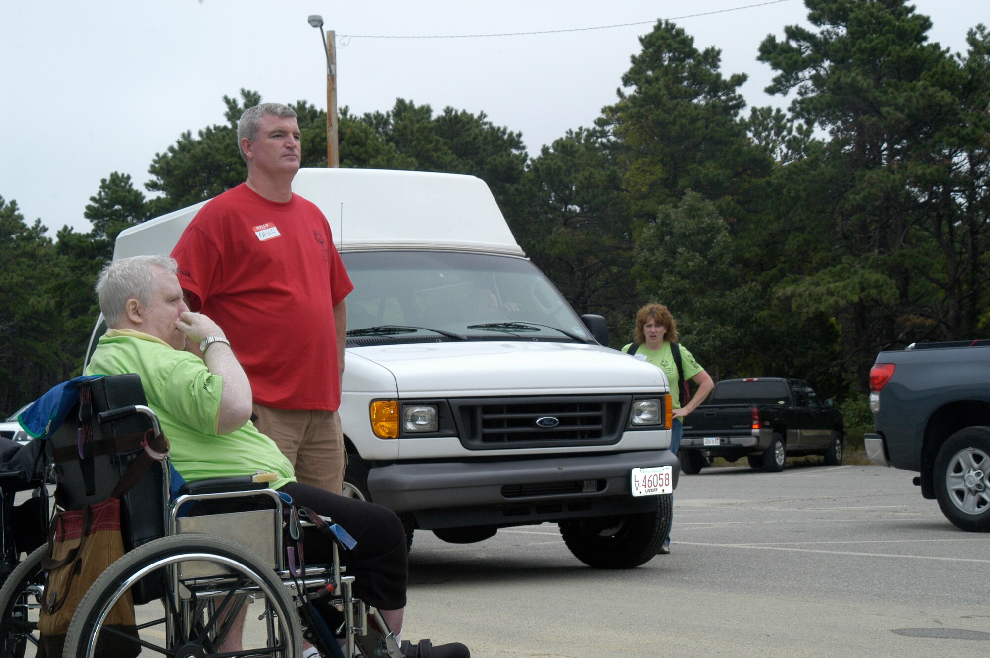 Technical Sgt. Paul Riordan, 102nd Intelligence Support Squadron, spends time with a Special Olympian from Braintree, Mass., at the conclusion of the 22nd annual Southeastern Massachusetts Special Olympics, Sept. 24, 2010.  The games were sponsored by the local Coast Guard Chief Petty Officers Association and military members from all branches of service stationed on or near the Massachusetts Military Reservation volunteered to assist with the day's events.  (U.S. Air Force photo by Evan C. Lagasse)                          
