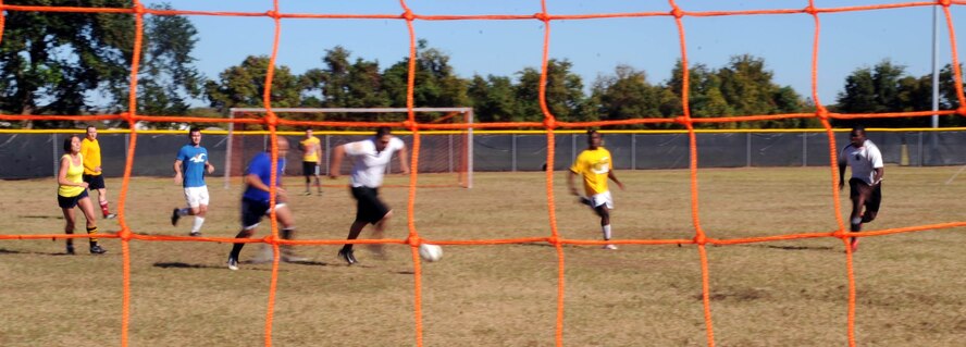 Airmen from the 2nd Communications Squadron compete against the 2nd Logistics Readiness Squadron in a game of soccer during the 2nd Mission Support Group Olympics at Barksdale Air Force Base, La. Oct. 28. The 2 MSG consists of more than 2,600 members who host 11,500 military, civilian, reserve personnel, 18,000 retirees and 28,000 family members on a base of 22,000 acres. (U.S. Air Force photo/Senior Airman Brittany Y. Bateman)