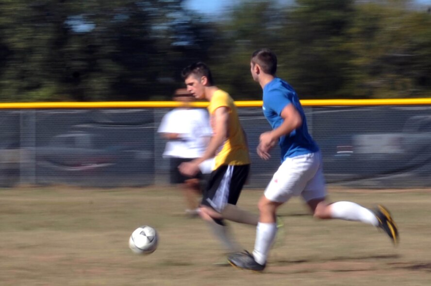 Airmen from the 2nd Communications Squadron compete against the 2nd Logistics Readiness Squadron in a game of soccer during the 2nd Mission Support Group Olympics at Barksdale Air Force Base, La. Oct. 28. The 2 MSG consists of more than 2,600 members who host 11,500 military, civilian, reserve personnel, 18,000 retirees and 28,000 family members on a base of 22,000 acres. (U.S. Air Force photo/Senior Airman Brittany Y. Bateman)