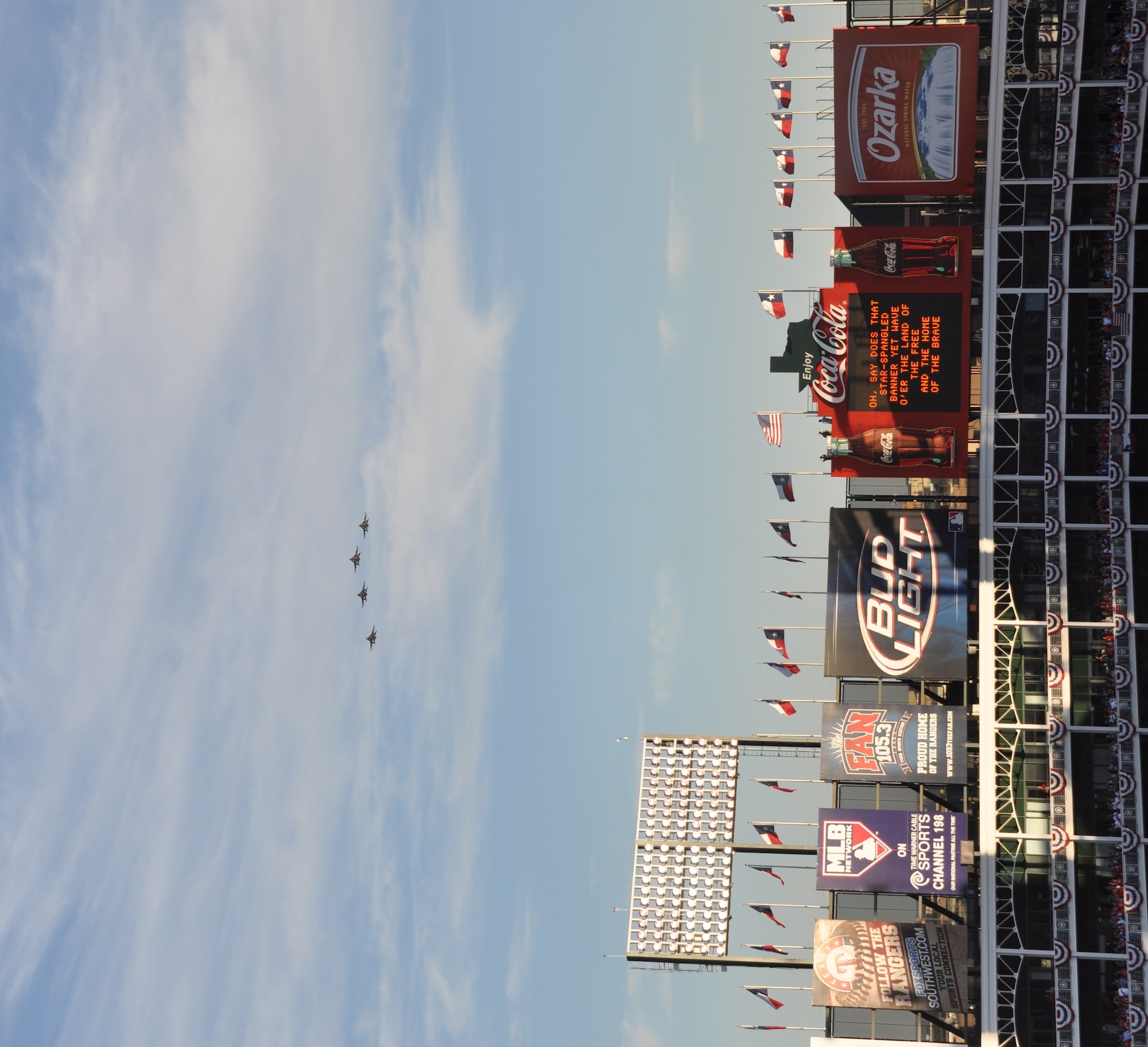 301st Fighter Wing F-16s fly over Ranger’s Ballpark in Arlington, Texas Saturday, October 30 before the third game of the 2010 World Series. The 301st Fighter Wing is located at Naval Air Station Fort Worth Joint Reserve Base, Texas. The game marked the first home appearance ot the Texas Rangers in a World Series. (U.S. Air Force photo/SrA Melissa Harvey)