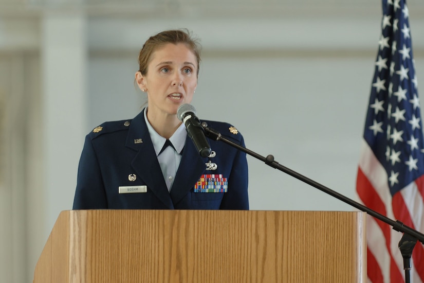 LANGLEY AIR FORCE BASE, Va. -- Maj. Elizabeth Boehm, 1st Maintenance Squadron commander, speaks during the 1st Component Maintenance Squadron inactivation and 1st Equipment Maintenance Squadron re-designation ceremony at the 149th Fighter Squadron Hangar Oct. 29. Major Boehm assumed command of the newly-re-designated squadron from Lt. Col. Jason Gibson. (U.S. Air Force photo/Airman 1st Class Jason J. Brown) (RELEASED)