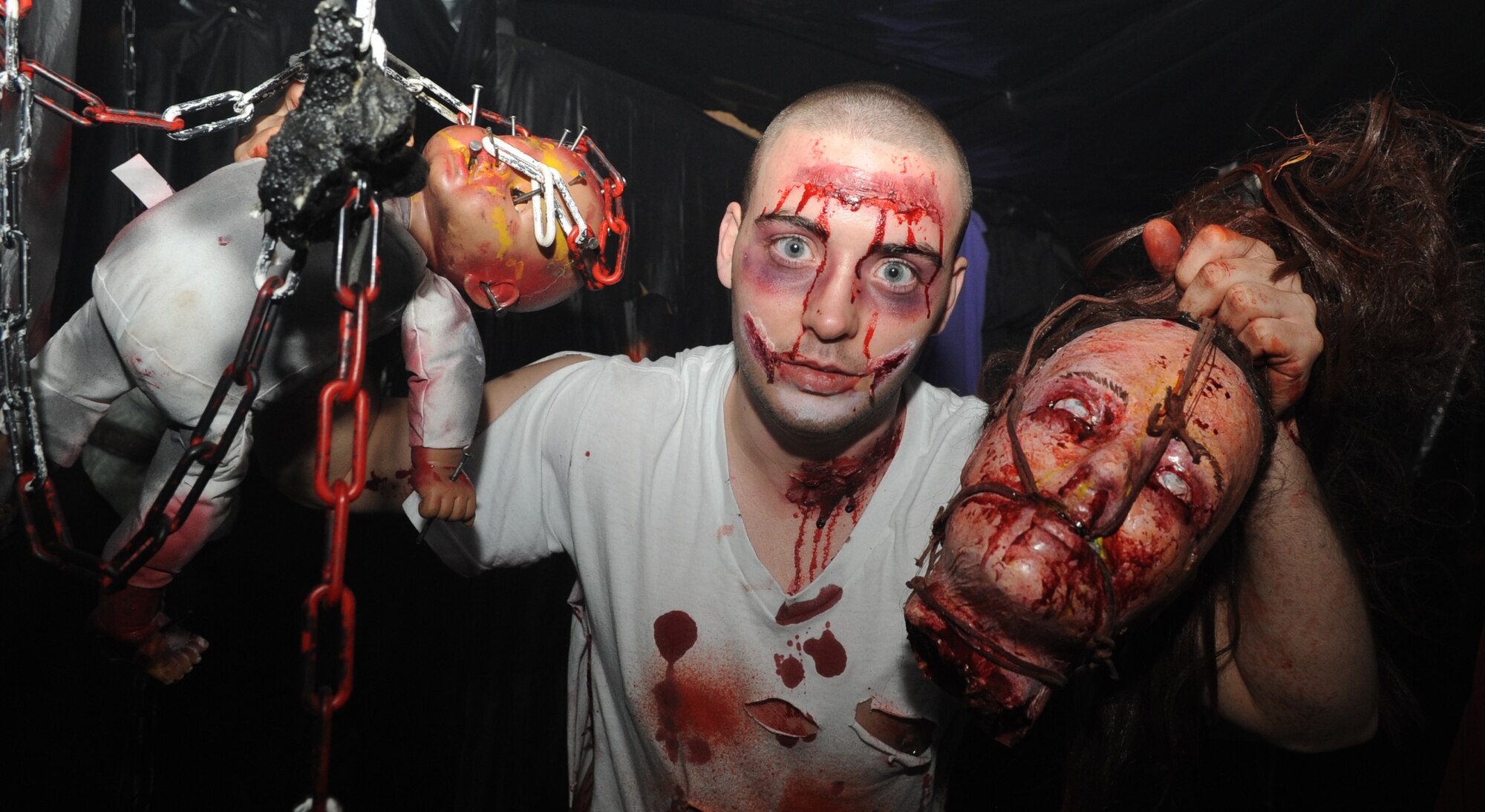 SPANGDAHLEM AIR BASE, Germany – Airman 1st Class Doug Wetter, 52nd Medical Operations Squadron, acts as a cannibal Oct. 30 during Bitburg Air Base’s annual Haunted House. The three-day event was open to the base and local national community. (U.S. Air Force photo/Senior Airman Nick Wilson)