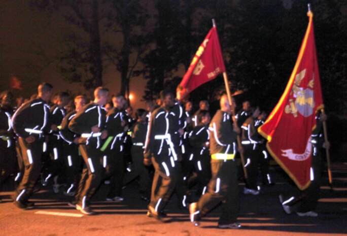 Marines and sailors with 2nd Marine Logistics Group participated in an MLG Fun Run aboard Camp Lejeune, N.C., Nov. 4, 2010.  The run was part of the Marine Corps’ 235th birthday celebration.  (U.S. photo by Lance Cpl. Katherine M. Solano)