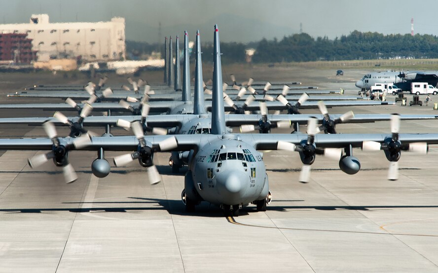 YOKOTA AIR BASE, Japan -- C-130 Hercules aircraft from the 36th Airlift Squadron taxi out for a mission during a seven-ship sortie. The squadron is the only forward-based tactical airlift squadron in the Pacific region. They provide C-130 aircrews to conduct theater airlift, special operations, aeromedical evacuation, search and rescue, repatriation and humanitarian relief missions. (U.S. Air Force photo/Osakabe Yasuo)
