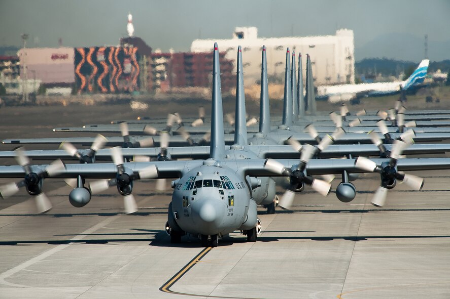 YOKOTA AIR BASE, Japan -- C-130 Hercules aircraft from the 36th Airlift Squadron taxi out for a mission during a seven-ship sortie. The squadron is the only forward-based tactical airlift squadron in the Pacific region. They provide C-130 aircrews to conduct theater airlift, special operations, aeromedical evacuation, search and rescue, repatriation and humanitarian relief missions. (U.S. Air Force photo/Osakabe Yasuo)