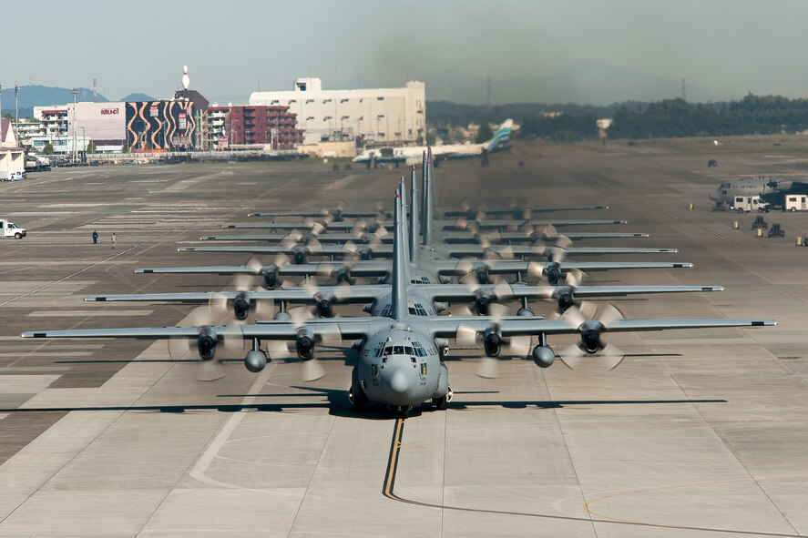 YOKOTA AIR BASE, Japan -- C-130 Hercules aircraft from the 36th Airlift Squadron taxi out for a mission during a seven-ship sortie. The squadron is the only forward-based tactical airlift squadron in the Pacific region. They provide C-130 aircrews to conduct theater airlift, special operations, aeromedical evacuation, search and rescue, repatriation and humanitarian relief missions. (U.S. Air Force photo/Osakabe Yasuo)