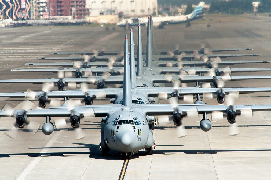 YOKOTA AIR BASE, Japan -- C-130 Hercules aircraft from the 36th Airlift Squadron taxi out for a mission during a seven-ship sortie. The squadron is the only forward-based tactical airlift squadron in the Pacific region. They provide C-130 aircrews to conduct theater airlift, special operations, aeromedical evacuation, search and rescue, repatriation and humanitarian relief missions. (U.S. Air Force photo/Osakabe Yasuo)